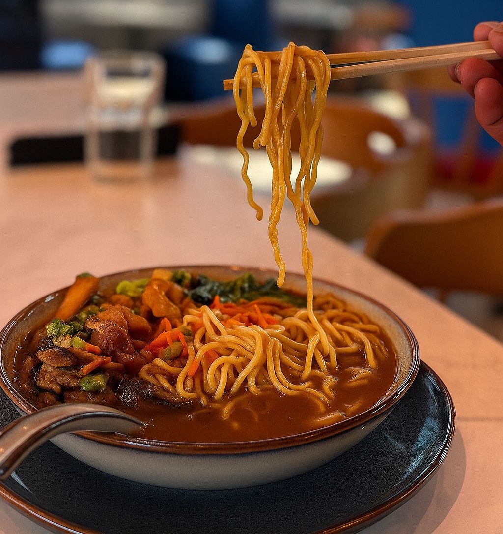noodles and toppings in bowl